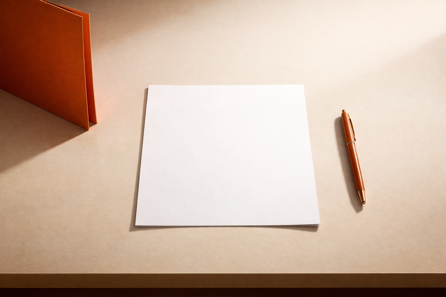 Single, unmarked worksheet on a clean desk, a bright orange divider beside it, and a pen laid parallel—warm, direct light and deep shadows. No people or visible text.